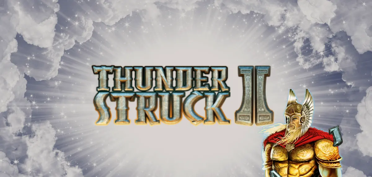 “Thunderstruck II title screen with metallic fantasy lettering on a radiant, cloud-filled sky background, featuring a muscular Viking god warrior in a winged helmet and red cape holding a hammer in the corner.”
